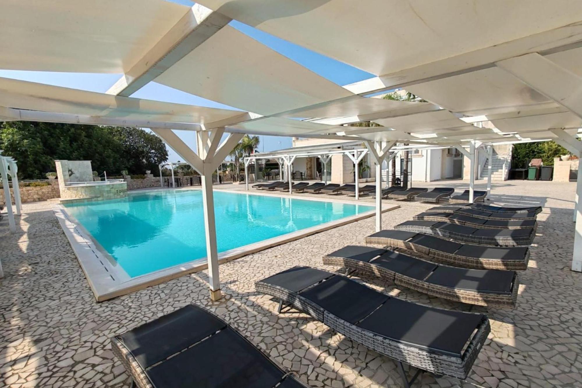 Pino Resort With Shared Pool Torre Lapillo Exterior photo